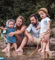 family at a lake